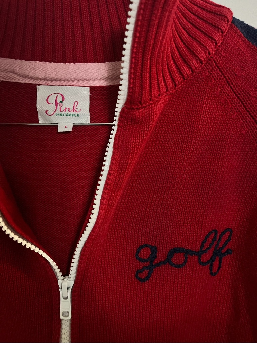 Pink Pineapple Women's Red Zip-Up Golf Sweater